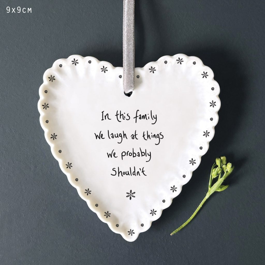 'In this family we laugh at things we probably shouldn't' Scalloped Heart Hanger