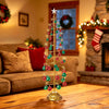 Lit Gold Metal Tree with Red and Green Baubles